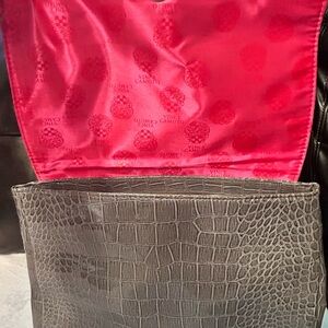 Hola Poshers a Vince Camino medium faux gray snake skin clutch, pink interior.